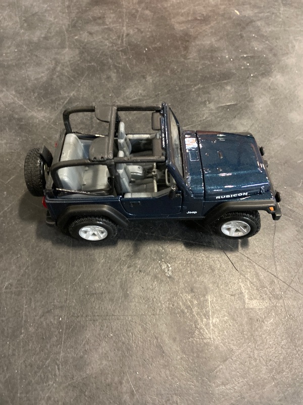 Photo 1 of Maisto 1:27 Scale Jeep Wrangler Rubicon Diecast Vehicle (Colors May Vary)