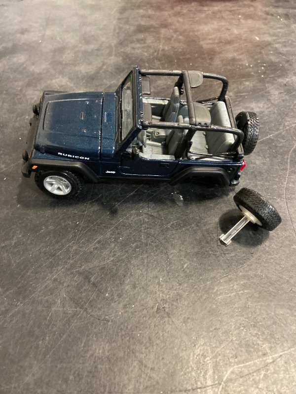 Photo 1 of Maisto 1:27 Scale Jeep Wrangler Rubicon Diecast Vehicle (Colors May Vary)