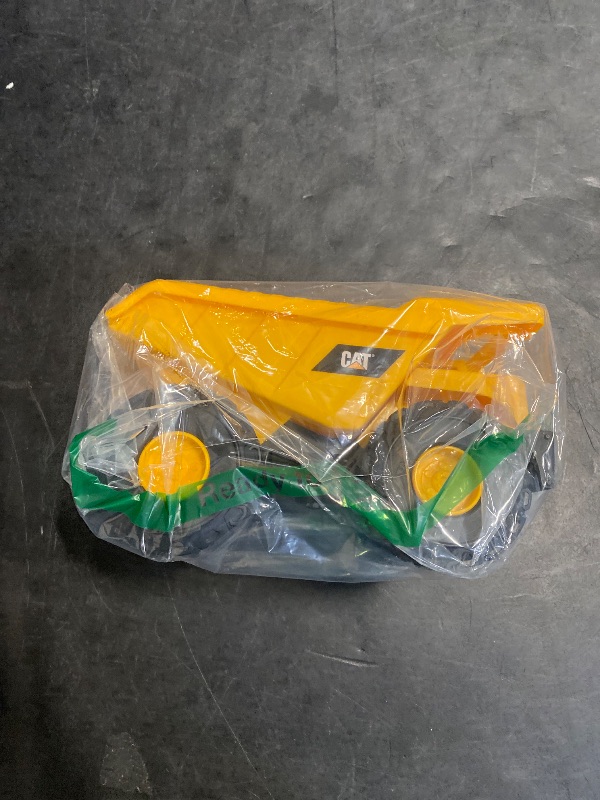 Photo 1 of CAT Construction Toys, CAT Dump Truck Toy Construction Vehicle – 10" Plastic Action Vehicle with Articulated Buckets for Indoor & Outdoor Play. Ages 3+