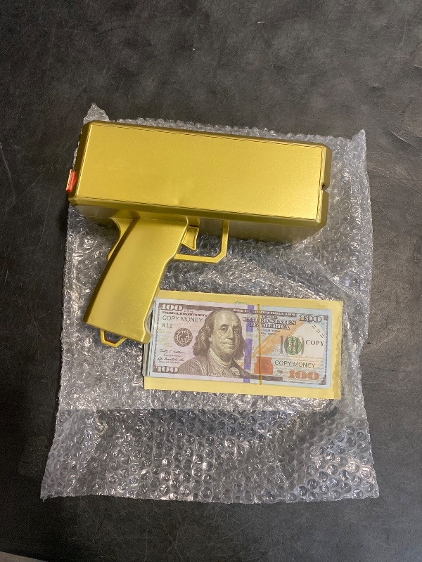 Photo 1 of Alagoo Super Money Guns Paper Playing Spary Money Gun Make it Rain Toy Gun, Handheld Cash Gun Fake Bill Dispenser Money Shooter Toy(Metallic Gold)