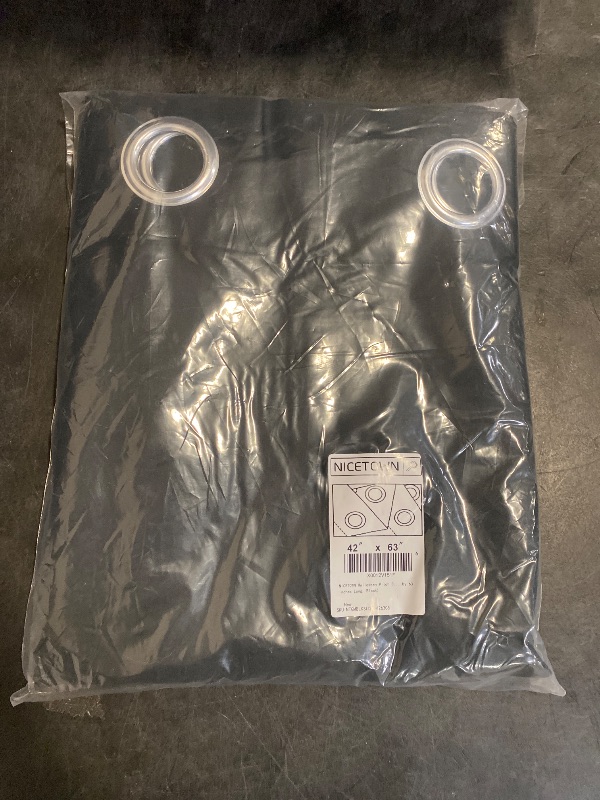 Photo 1 of NICETOWN Halloween Pitch Black Solid Thermal Insulated Grommet Blackout Curtains/Drapes for Bedroom Window (2 Panels, 42 inches Wide by 63 inches Long, Black)