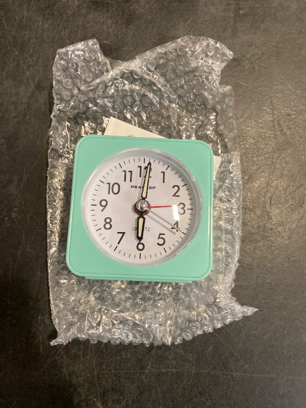 Photo 1 of Peakeep Ultra Small, Battery Travel Alarm Clock with Snooze and Light, Silent with No Ticking Analog Quartz (Aquamarine)