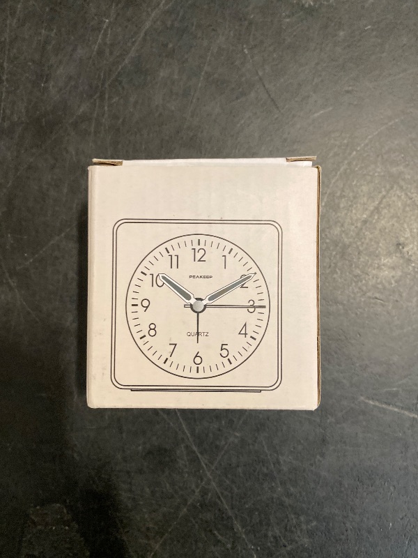 Photo 1 of Peakeep Ultra Small, Battery Travel Alarm Clock with Snooze and Light, Silent with No Ticking Analog Quartz (Aquamarine)