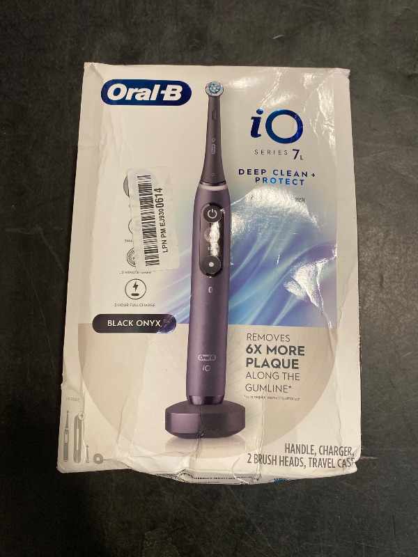 Photo 1 of Oral-B iO Deep Clean + Protect Rechargeable Electric Toothbrush, Black with a iO Series 7 Toothbrush, 2 Replacement Brush Heads, and a Charging Travel Case