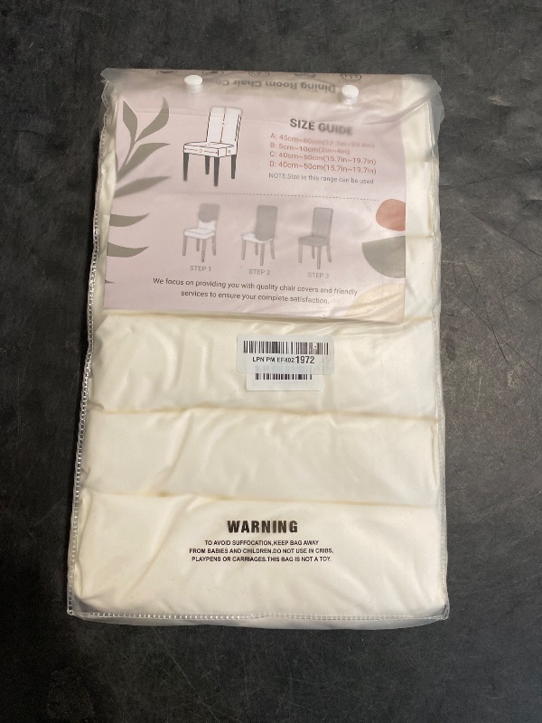 Photo 1 of SearchI Waterproof PU Leather Dining Chair Covers Set of 6, Stretch Oilproof Parsons Chair Slipcovers Removable Washable Kitchen Chair Protector for Dining Room (Cream)
