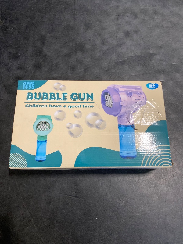 Photo 1 of Automatic Bubble Guns with Light, Zealous 2pc High Output Bubble Machines with Bubble Solution & Bubble Concentrate,Handheld Battery Operated Bubble Maker Toys for 3000+ (Bubble-White)