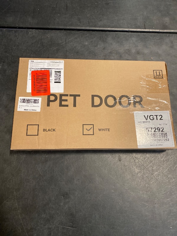 Photo 1 of Fldofaves Dog Gate - 18"-45" Adjustable Extra Wide Metal Short Dog Gate to Step Over, 10" Tall Small Pet Gate with 3 Extension Kits, Pressure Mounted for Doorways & Stairs