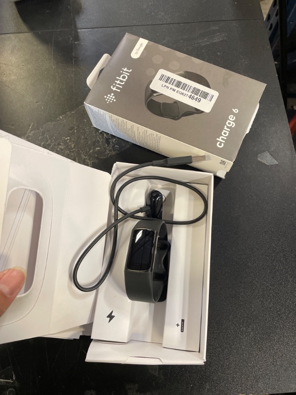 Photo 1 of Fitbit Charge 6 Fitness Tracker with Google apps, Heart Rate on Exercise Equipment, 6-Months Premium Membership Included, GPS, Health Tools and More, Obsidian/Black, One Size (S & L Bands Included)