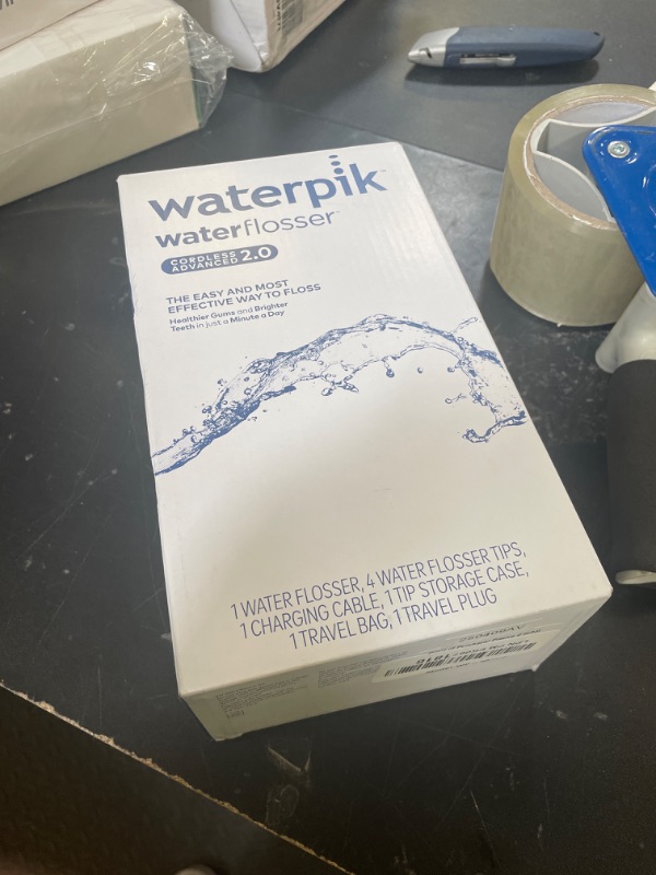 Photo 1 of Waterpik Cordless Advanced 2.0 Water Flosser For Teeth, Gums, Braces, Dental Care With Travel Bag and 4 Tips, ADA Accepted, Rechargeable, Portable, and Waterproof, Gray WP-587, Packaging May Vary