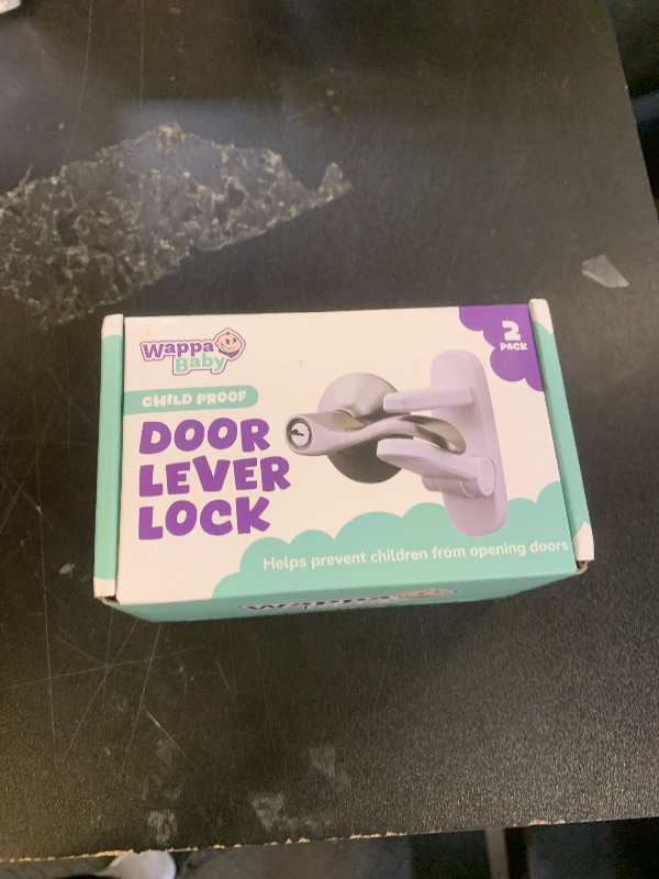 Photo 1 of Door Lever Lock (2 Pack) – Prevents Toddlers from Opening Doors – Easy One-Hand Operation for Adults – Durable ABS with 3M Adhesive Backing – No Tools Needed for Install