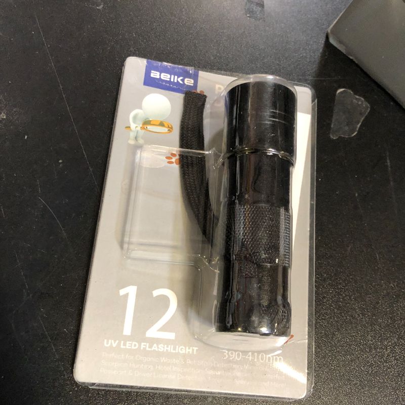 Photo 1 of UV Flashlight Black Light–Small Portable Mini 12 LED Blacklight Flashlight for Hidden Stain Detection in Room, Resin Curing,Scorpion & Bed Bug Find,Pet Urine & Dry Stain Detection/Carpets/Rugs/Floors