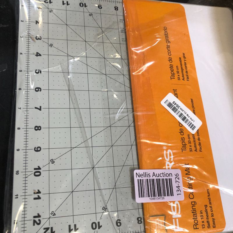 Photo 1 of Fiskars Rotating Cutting Mat - 14" x 14" Grid to Cut Fabric Squares Easily - Perfect for Quilting, Sewing and Craft Projects - Self-Healing Mat - Gray