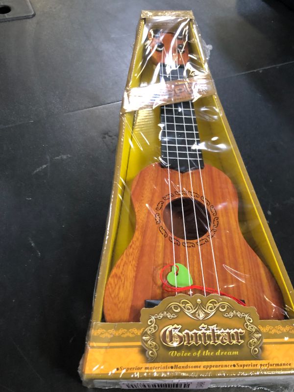 Photo 1 of Kids Toy Ukulele Guitar,17 Inch Classical Guitar Musical Toy,4 Strings Guitar Ukulele Educational Learning Toy for Toddlers and Preschoolers