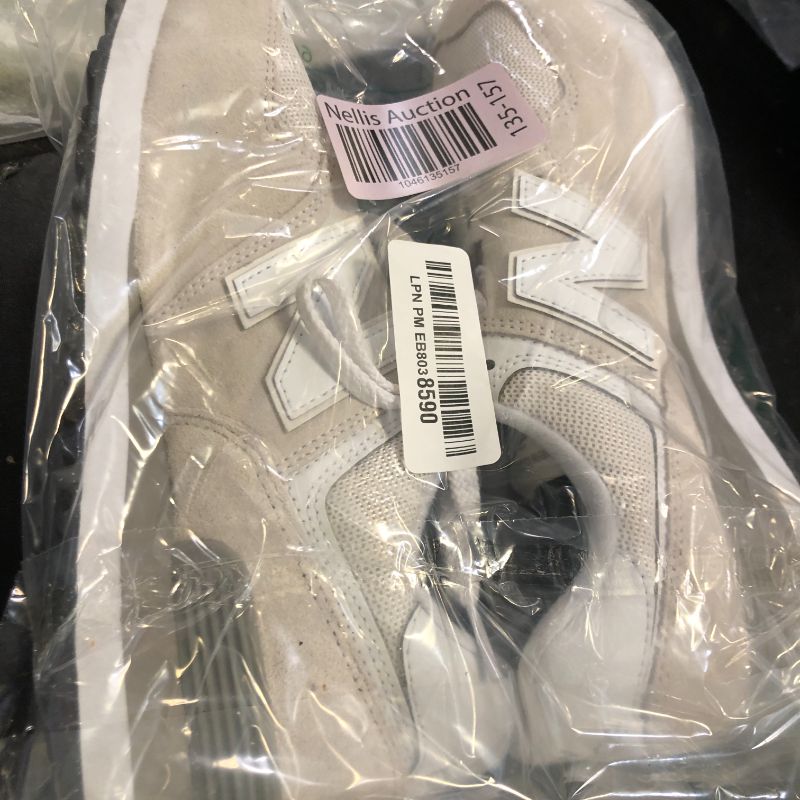 Photo 1 of New Balance Women's 574 Core Sneaker, Nimbus Cloud/White, 8.5 Wide