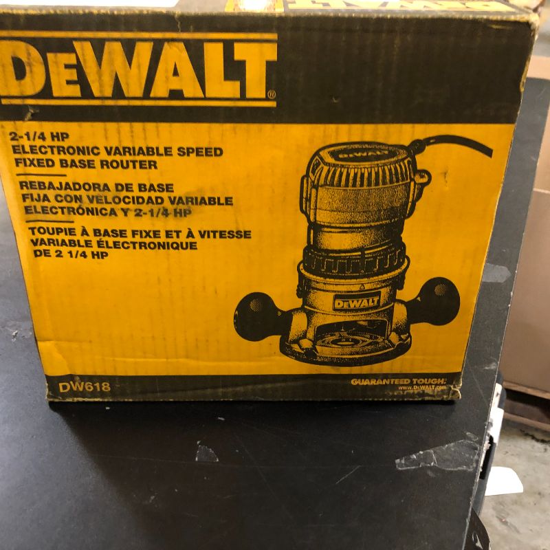 Photo 1 of DEWALT Router, Fixed Base, 12-Amp, 24,000 RPM Variable Speed Trigger, 2-1/4HP, Corded (DW618)