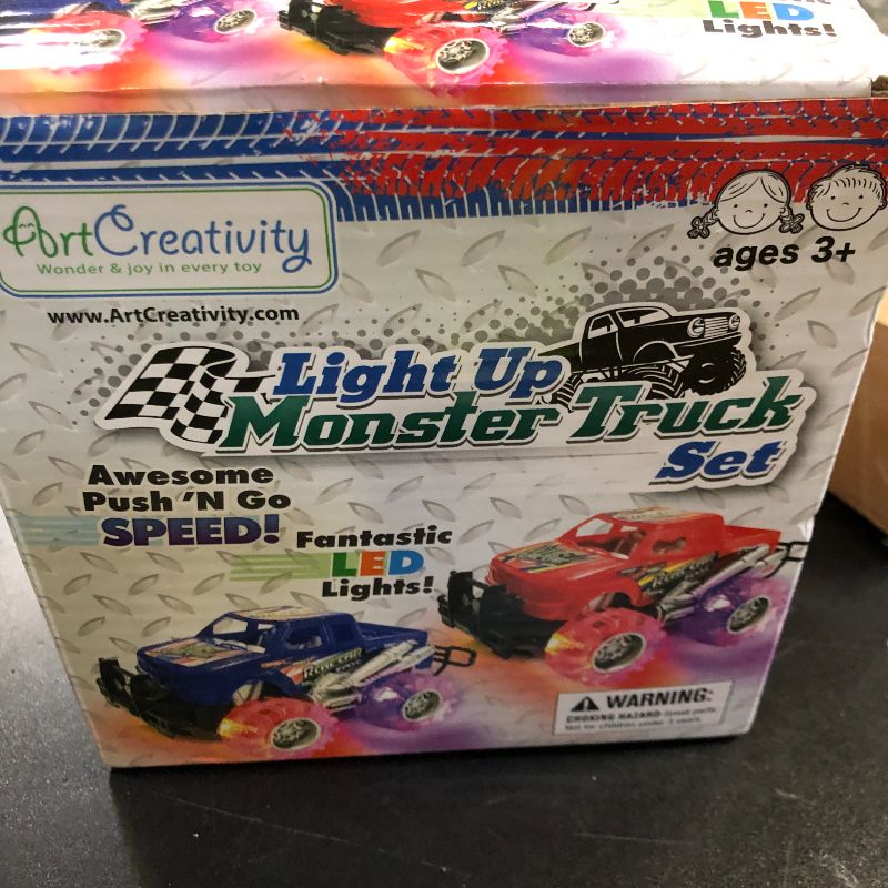 Photo 1 of Light-Up Monster Truck Toys (2-Pack) – Push-&-Go Cars with Glowing Wheels – Birthday Gift for Toddlers, Boys & Girls Ages 3+ – Durable Friction-Powered Trucks – Batteries Included