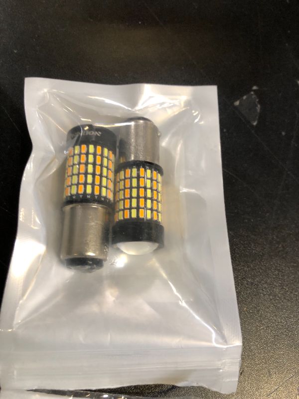 Photo 1 of PHINLION Super Bright White Amber Dual Color Switchback 1157 2057 2357 7528 LED Bulbs with Projector for Car Front Turn Signal Parking Lights