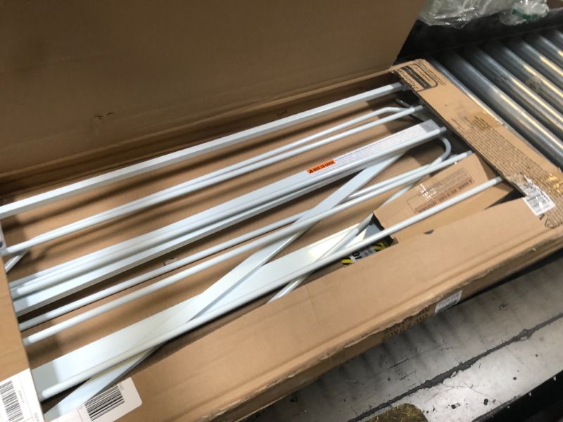 Photo 1 of Missing a screw----Regalo 36-Inch Extra Tall and 49-Inch-Wide Walk Thru Baby Gate, includes 4-Inch and 12-inch Extension Kit, 4 Pack of Pressure Mount Kit and 4 Pack of Wall Mount Kit