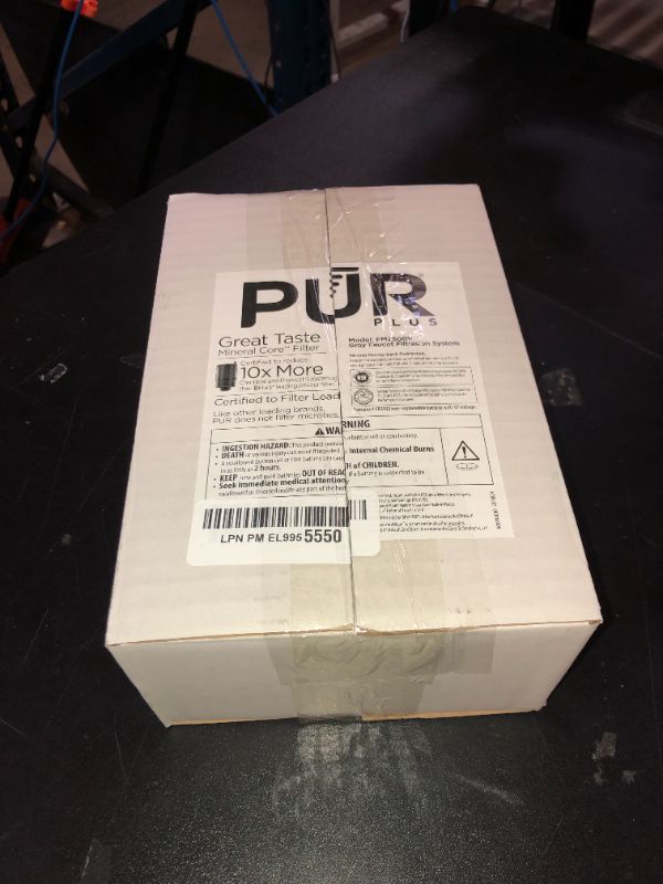 Photo 1 of PUR PLUS Vertical Faucet Mount Water Filtration System, Lead-Reducing Filter, Great-Tasting Water, Easy Install, Lasts 100 Gallons, Compatible with Sinks with External Aerators, Grey