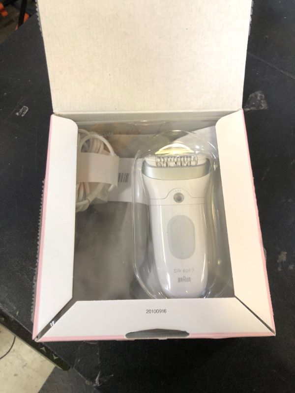 Photo 1 of Braun Epilator Silk-épil 7, Hair Removal Device, Women Shaver & Trimmer, Wet and Dry, Wide Head, Includes Shaver Head and Trimmer Comb, SE7-041, Silver