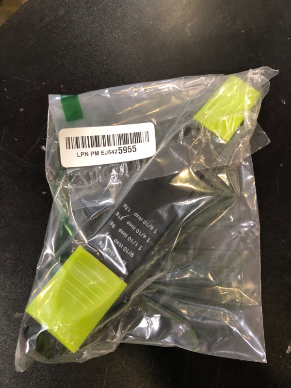 Photo 1 of Performore Adjustable Measuring Spoon (Green, Black) with Double End Adjustable Scale, 9 Stalls All in One Measuring Spoon, Wide Range of Measurements, Dry and Semi-Liquid Ingredients