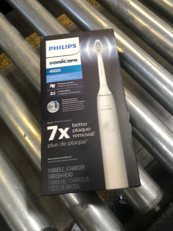 Photo 1 of Philips Sonicare 4100 Rechargeable Electric Toothbrush, with Pressure Sensor, 2 Intensity Settings, SmarTimer and QuadPacer, 14-Day Battery Life, White, Model HX3681/23