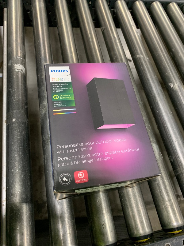 Photo 1 of Philips Hue Resonate Outdoor Smart Wall Light, Black - White and Color Ambiance LED Color-Changing Light - 1 Pack - Requires Hue Bridge - Control with Hue App and Voice - Weatherproof