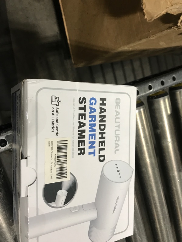 Photo 1 of HANDHELD GARMENT STEAMER