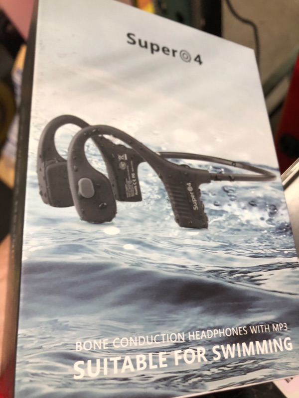 Photo 1 of Bone conduction headphones swimming underwater IPX8 waterproof headsets bluetooth wireless built in 32GB MP3 player multi-point connection magnetic charging 240mAh large battery for 12 Hrs playtime
