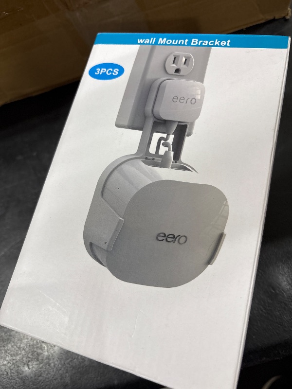 Photo 1 of COOLWUFAN Outlet Wall Mount Holder for eero 6 or eero 6+ mesh Wi-Fi System [NOT Fit for eero mesh], No Messy Wires, Easy to Install Mount Holder for eero 6 & eero 6+ mesh Wi-Fi System (3 Pack)