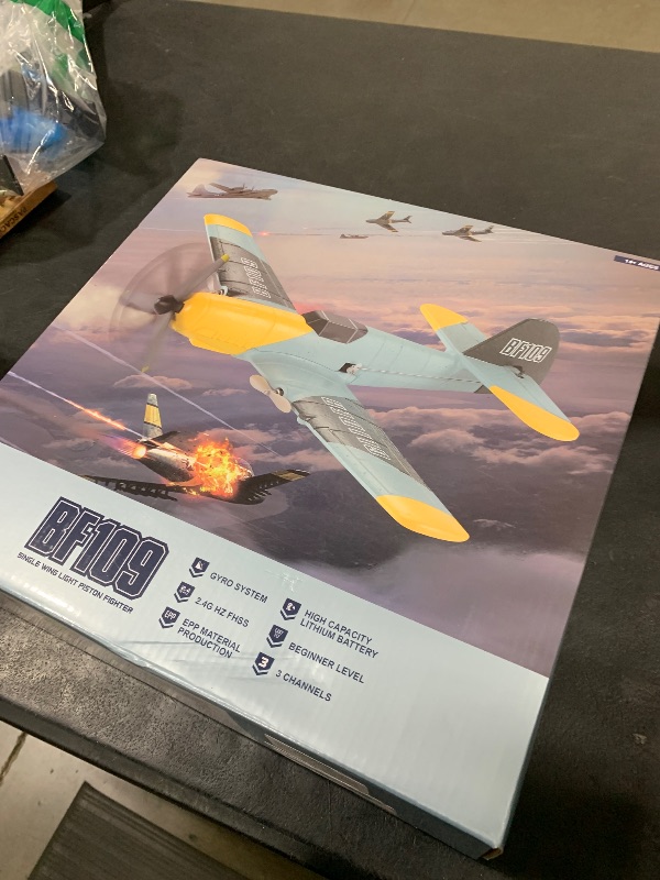 Photo 1 of Toileum RC Plane, 3 Channel Remote Control Airplane, 6-axis Gyro Stabilizer BF-109 RTF RC Airplane with 2 Batteries, Easy to Fly for Beginners Adults and Kids