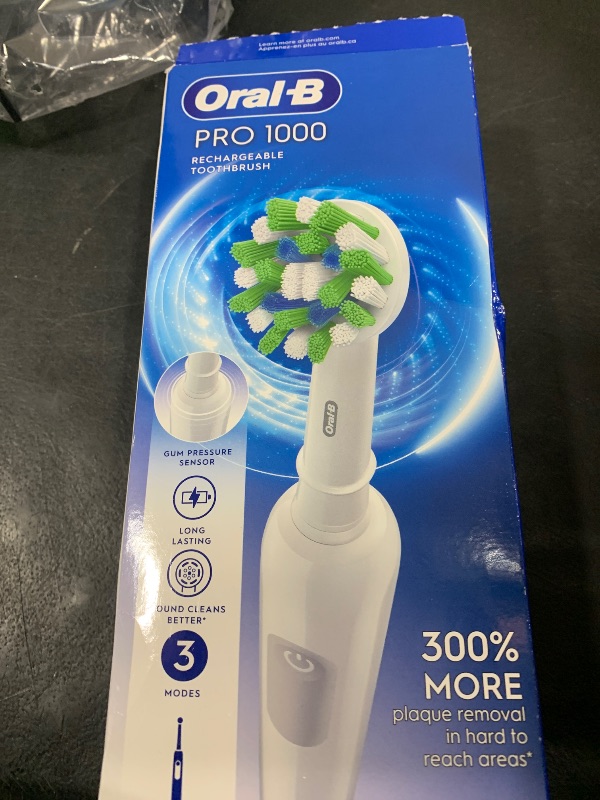 Photo 1 of Oral-B Pro 1000 Rechargeable Electric Toothbrush, White