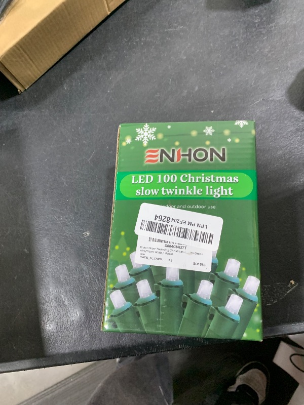 Photo 1 of Enhon Slow Twinkling Christmas Light, 100 Lights 35 Ft Twinkle Pulsing Christmas, 5mm LED Wide Angle Soft Random Shimmering Set with Green Wire(Warm White,1 Pack)