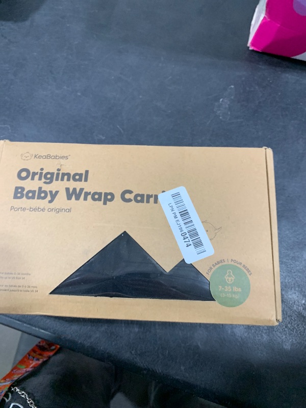 Photo 1 of KeaBabies Baby Wrap Carrier - All in 1 Original Baby Carrier Newborn to Toddler Sling, Easy to Wear, Hands Free Bonding, Lightweight, Breathable Infant Wraps (Trendy Black)