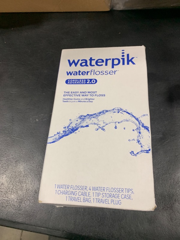 Photo 1 of Waterpik Cordless Advanced 2.0 Water Flosser For Teeth, Gums, Braces, Dental Care With Travel Bag and 4 Tips, ADA Accepted, Rechargeable, Portable, and Waterproof, White WP-580, Packaging May Vary