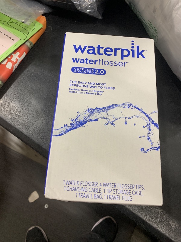 Photo 1 of Waterpik Cordless Advanced 2.0 Water Flosser For Teeth, Gums, Braces, Dental Care With Travel Bag and 4 Tips, ADA Accepted, Rechargeable, Portable, and Waterproof, Black WP-582, Packaging May Vary