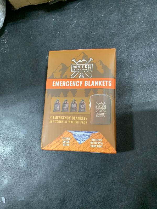 Photo 1 of Don't Die In The Woods - Freakin’ Huge Emergency Blankets [4-Pack] Extra-Large Thermal Mylar Space Blankets with Ripstop Nylon Stuff Sacks + Carabiner Zipper Pack [Survival Orange]