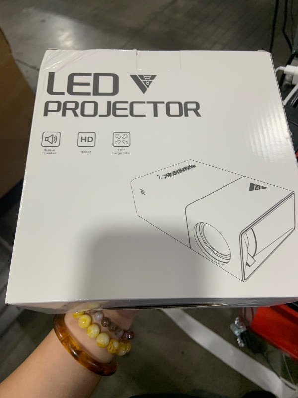 Photo 1 of KHQ Mini Projector with Wifi Portable Projector Support 1080P 200" Mini HD Movie Projector, Outdoor Projector Compatible with Phone/ Tablet/ Laptop/ TV Stick/ PS4/ HDMI/USB - Pink White