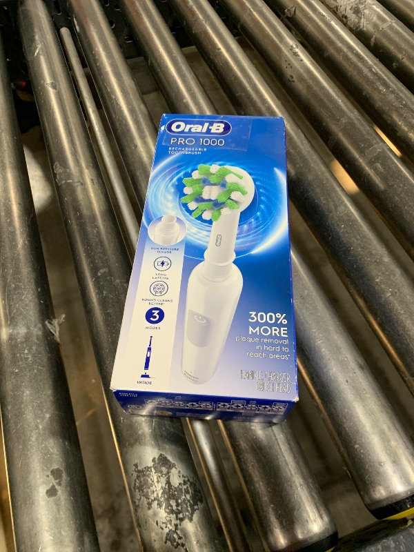 Photo 1 of Oral-B Pro 1000 Rechargeable Electric Toothbrush, White