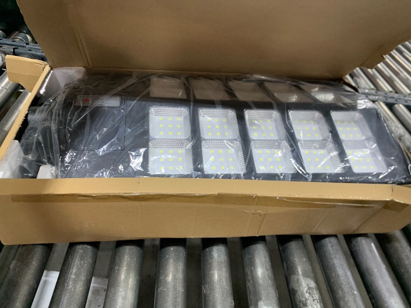 Photo 1 of JAYNLT Y-5200W Solar Street Lights Outdoor,520000LM 6500K Commercial Parking Lot Lights Dusk to Dawn, Waterproof Solar Security Flood Lamps with Motion Sensor and Remote for Yard, Garage, Driveway