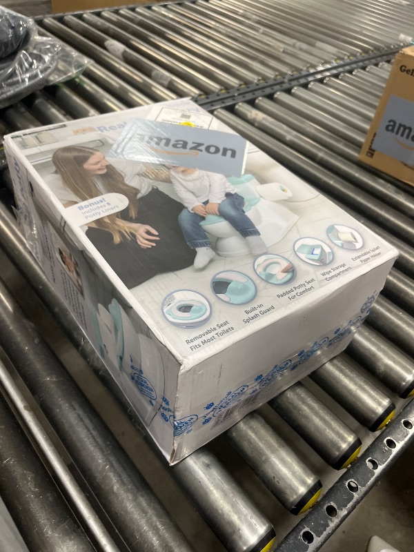 Photo 1 of Real Feel 2-in-1 Potty with Wipes Storage, Flushing Sounds & Disposable Liners - Realistic Toilet - Easy to Clean & Assemble - Jool Baby (Aqua)