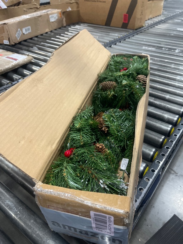 Photo 1 of National Tree Company Pre-Lit Artificial Christmas Garland, Green, Crestwood Spruce, White Lights, Decorated with Glitter, Pinecones, Berry Clusters, Battery Operated, Christmas Collection, 9 Feet