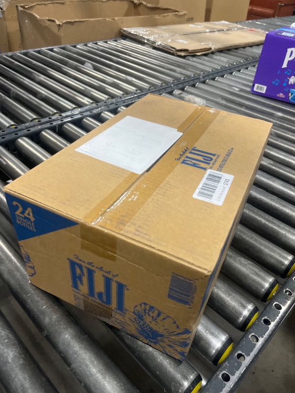 Photo 1 of FIJI Natural Artesian Bottled Water 500mL / 16.9 Fl Ounce (Pack of 24) - 100% Natural Electrolytes ---- B.B. 01-11-2026