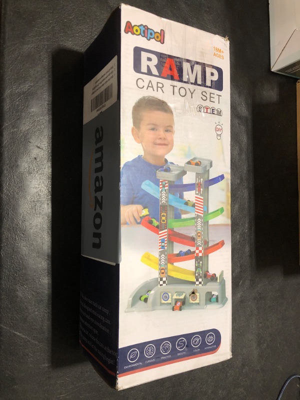 Photo 1 of Montessori Toys for 2 3 Year Old Boys Toddlers, Car Ramp Toys with 6 Cars & Race Tracks, Garages and Parking Lots, Ramp Racer Toy Gift for Boys Girls Age 18 Months and Up, Multicolor