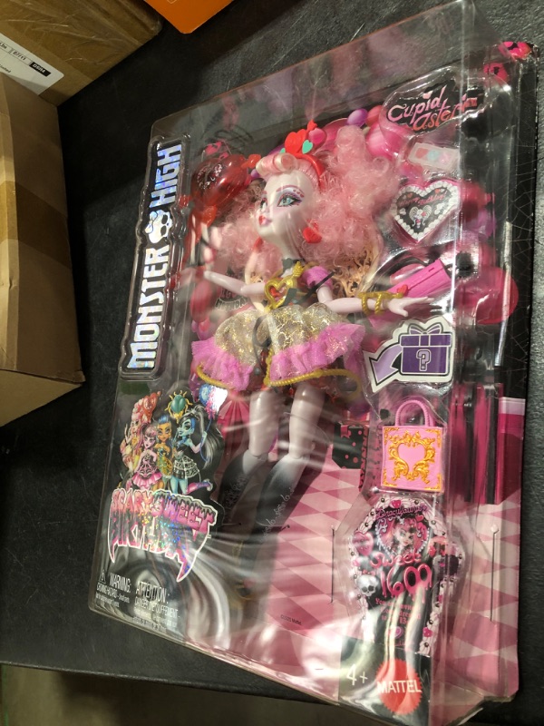 Photo 1 of Monster High Scary Sweet Birthday Doll, Cupid Asteria in Pink and Red Party Dress with Themed Accessories Like Invite, Balloon, Gift and More