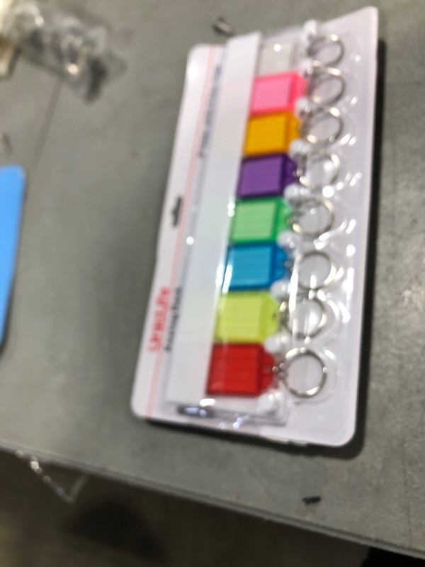 Photo 1 of Uniclife Key Tag Rack Slot Style Plastic Wall Mounted Key Holder Organizer with Transparent Tough Key Tag Identifiers Markers in 8 Assorted Colors, 2 Pack