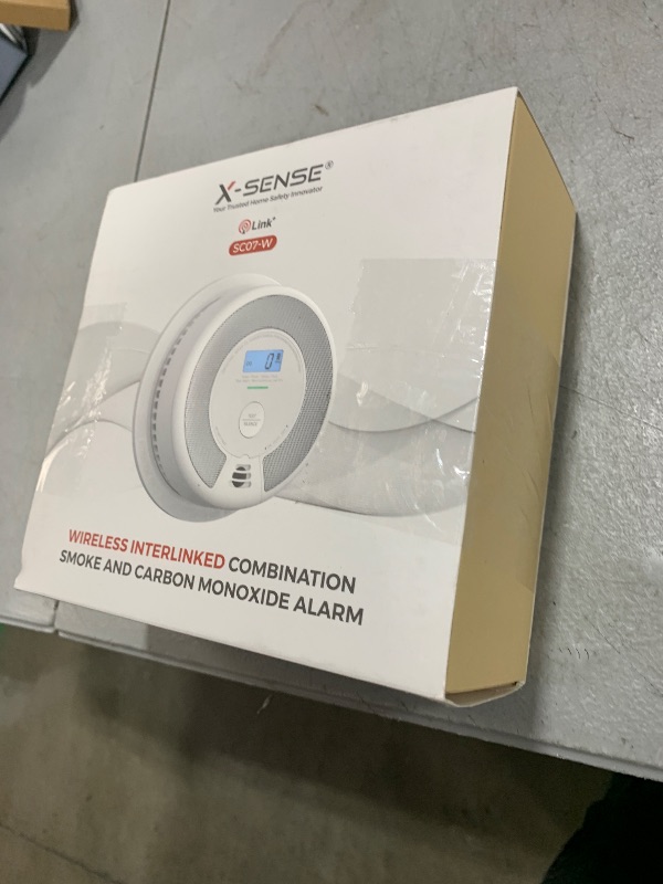 Photo 1 of X-Sense Wireless Interconnected Combination Smoke and Carbon Monoxide Detector with LCD Display & 10-Year Battery, Over 820 ft Transmission Range, 1-Pack