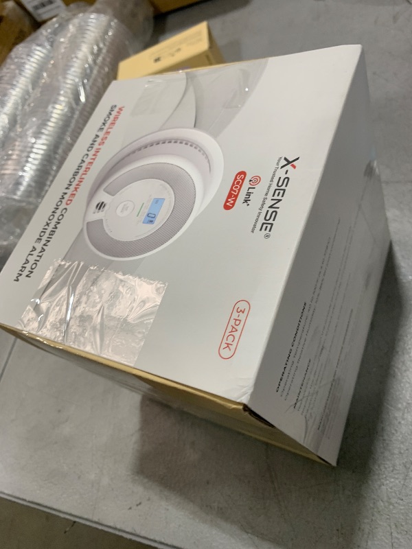 Photo 1 of X-Sense Wireless Interconnected Combination Smoke and Carbon Monoxide Detector with LCD Display & 10-Year Battery, Over 820 ft Transmission Range, 3-Pack