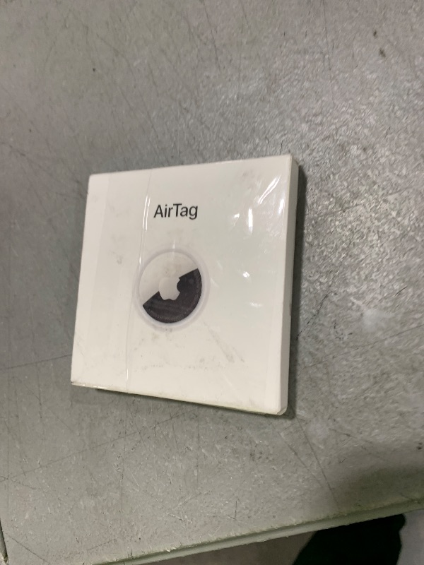 Photo 1 of Apple AirTag. Keep Track of and find Your Keys, Wallet, Luggage, Backpack, and More. Simple one-tap Set up with iPhone or iPad