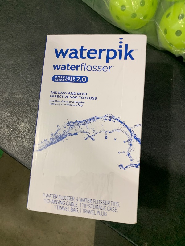 Photo 1 of Waterpik Cordless Advanced 2.0 Water Flosser For Teeth, Gums, Braces, Dental Care With Travel Bag and 4 Tips, ADA Accepted, Rechargeable, Portable, and Waterproof, Blue WP-583, Packaging May Vary